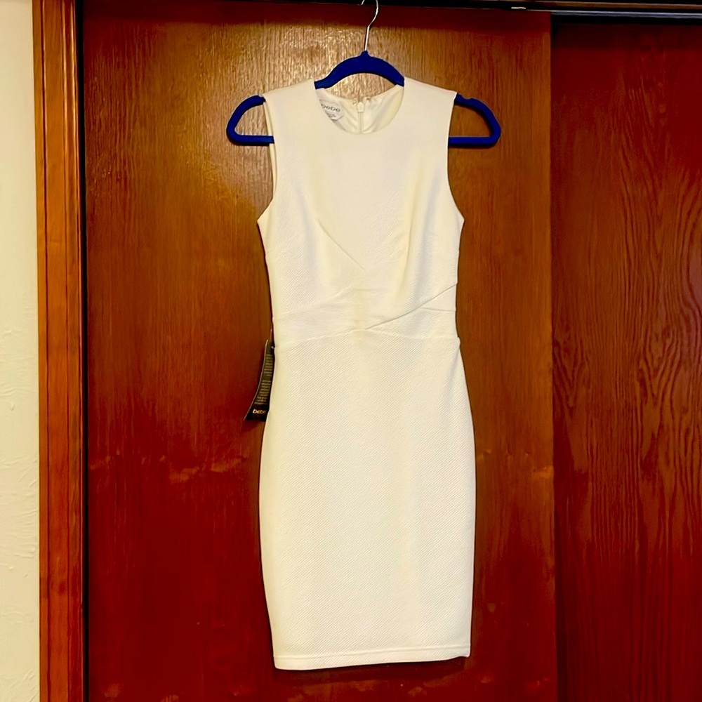 Bebe dress, bondage style, white